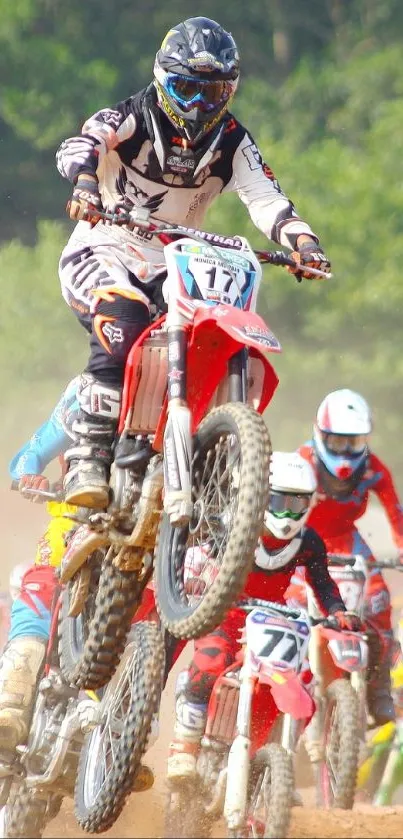 Motocross riders in action during a thrilling dirt bike race.