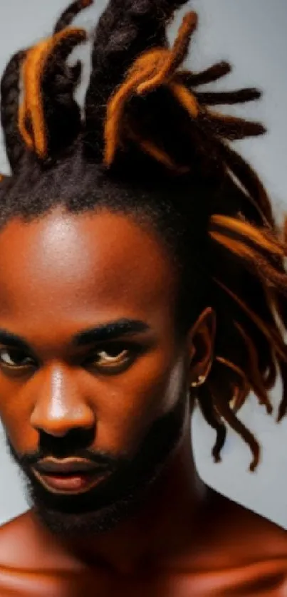 Portrait with dynamic brown dreadlocks and expressive look.