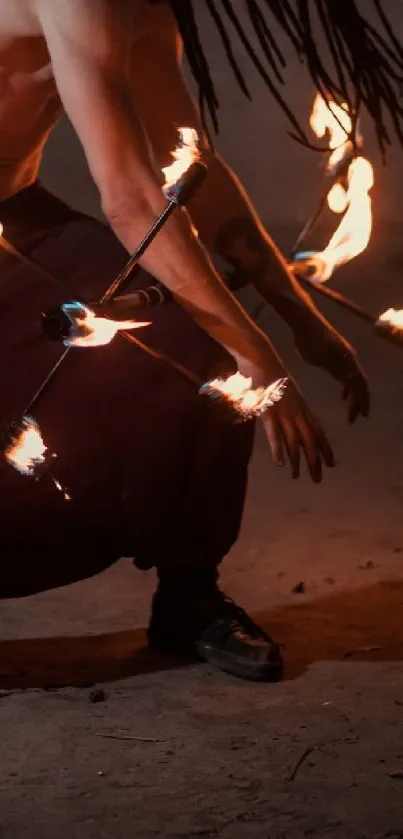 A captivating image of a fire dancer in motion against a dark background.