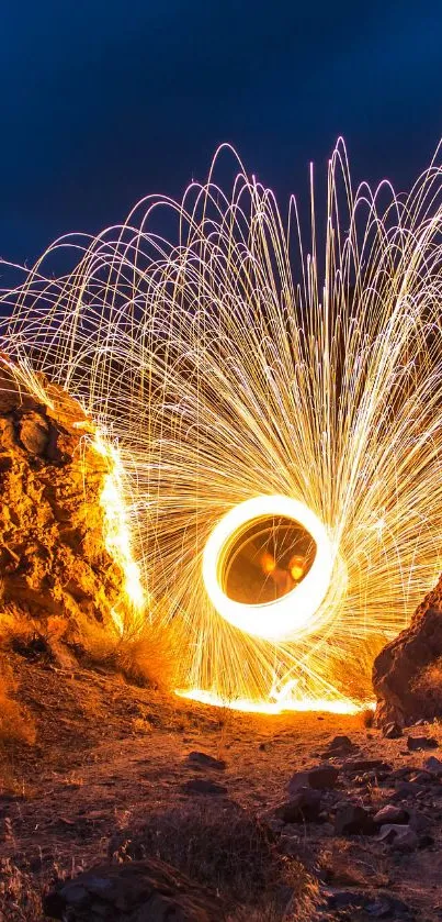 Dynamic fireworks illuminate rocky landscape in a vibrant night display.