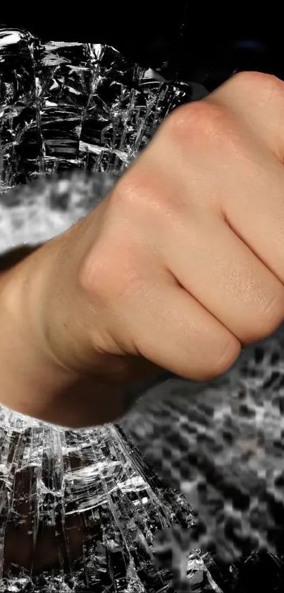 Fist breaking through glass, symbolizing strength.