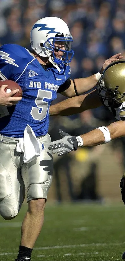 Football player dodges tackle in intense game action.