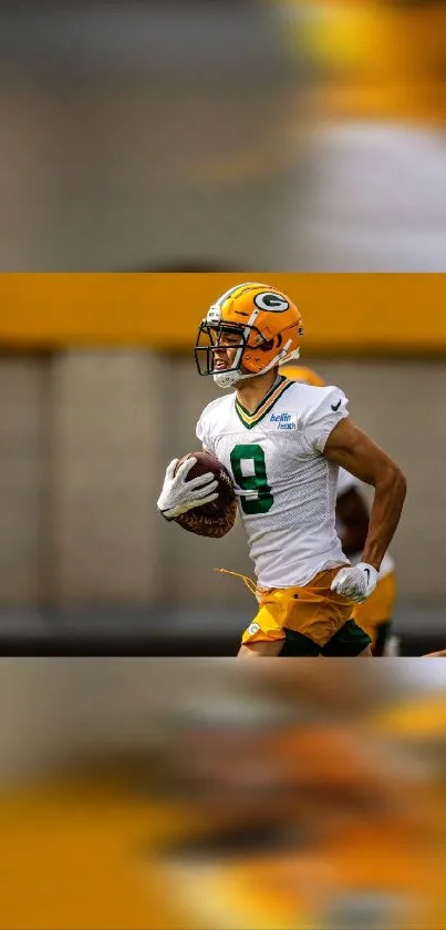 Football player in yellow and green uniform running on field.