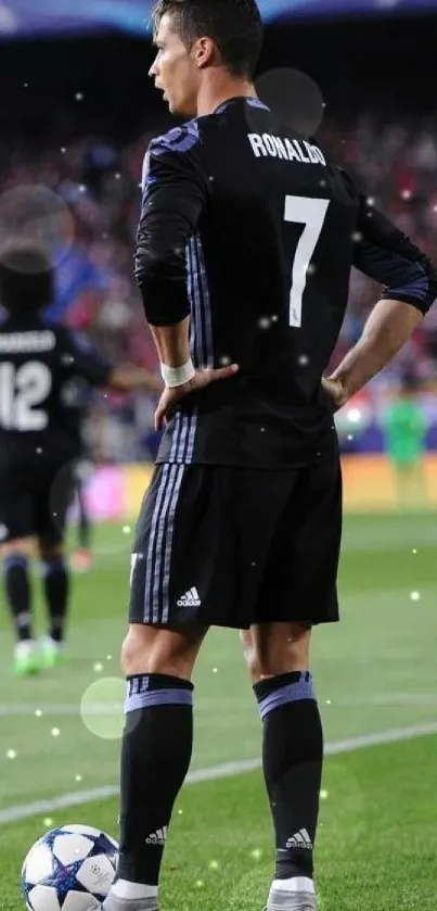 Athlete in black uniform on the football field during a game.