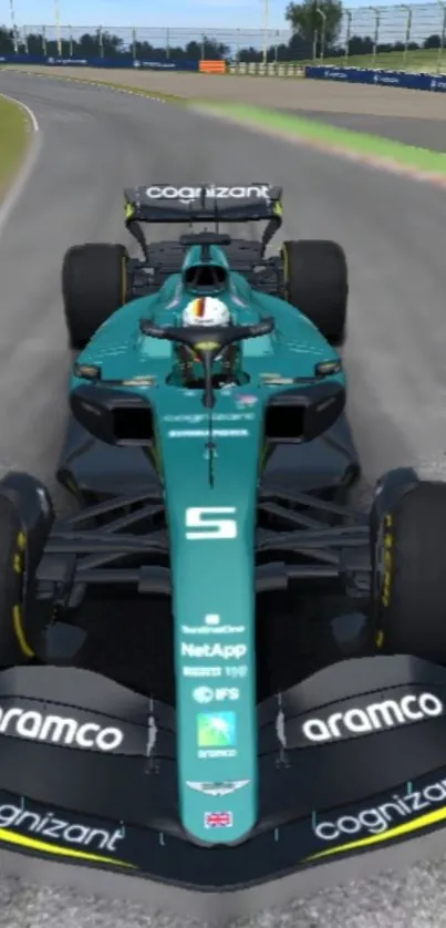 Vibrant teal Formula car racing on a curving track.