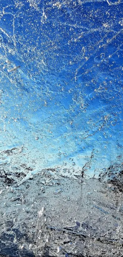 Ice patterns against a clear blue sky wallpaper for phones.