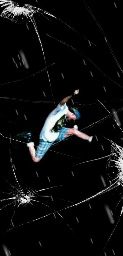 Person jumping through shattered glass on a dark background.