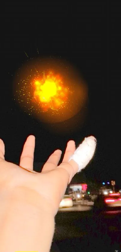 Hand reaching towards a glowing light burst in the night.