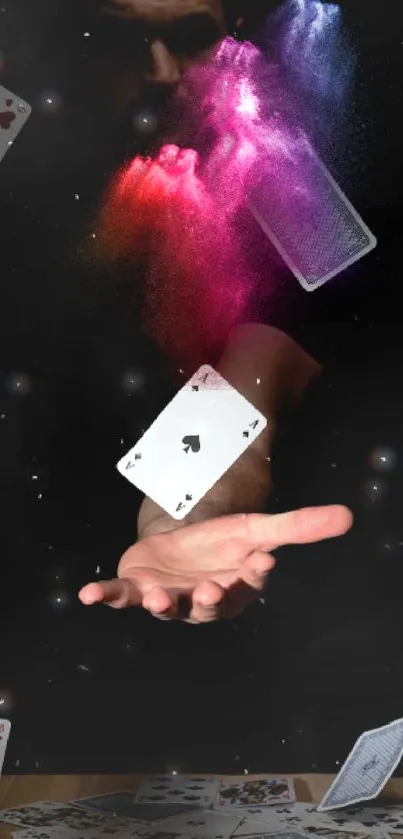 Magical display of falling cards and colorful smoke on a black background.