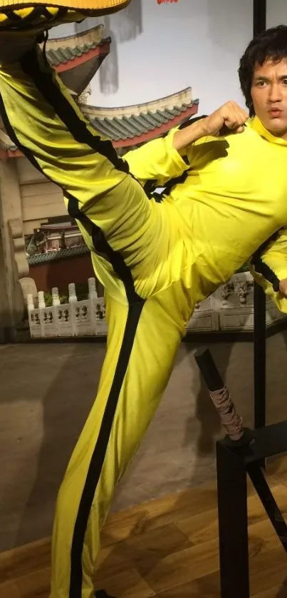 Martial artist in dynamic high kick pose with vibrant yellow suit.