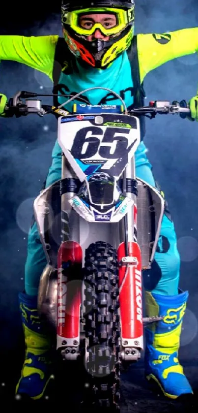 Motocross rider in vibrant gear on a motorcycle with a smoky background.