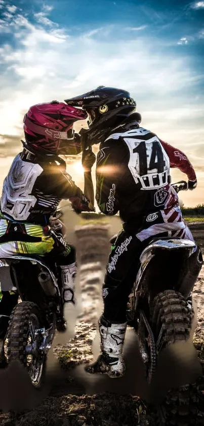Motocross riders enjoy a sunset adventure on bikes.