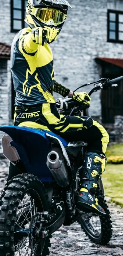 Motocross rider on bike in vibrant gear.