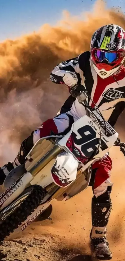 Motocross rider kicking up dirt at high speed.