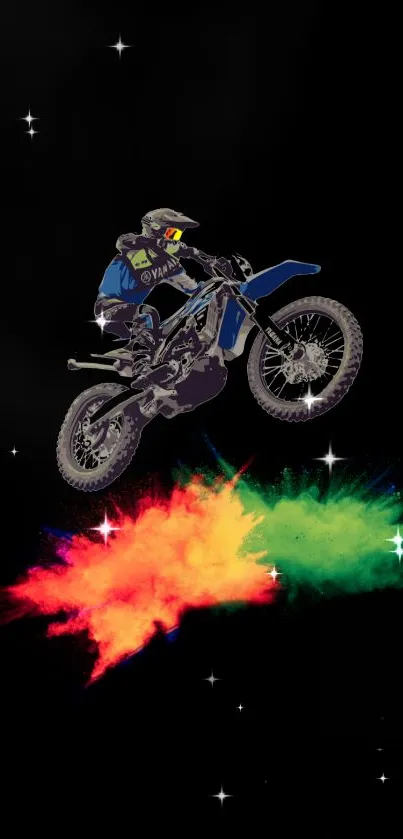 Motocross rider jumps with vibrant colors against starry night backdrop.