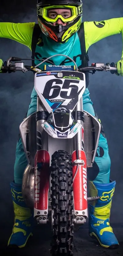 Motocross rider in vibrant gear racing with smoky background.