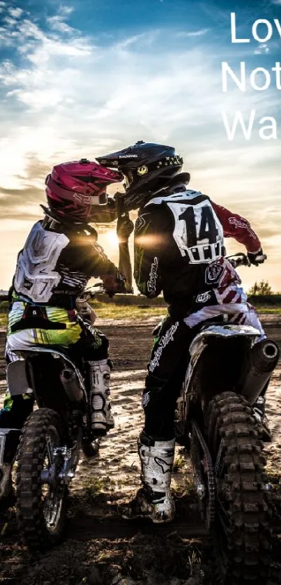 Two motocross riders at sunset with 'Make Love Not War' theme.