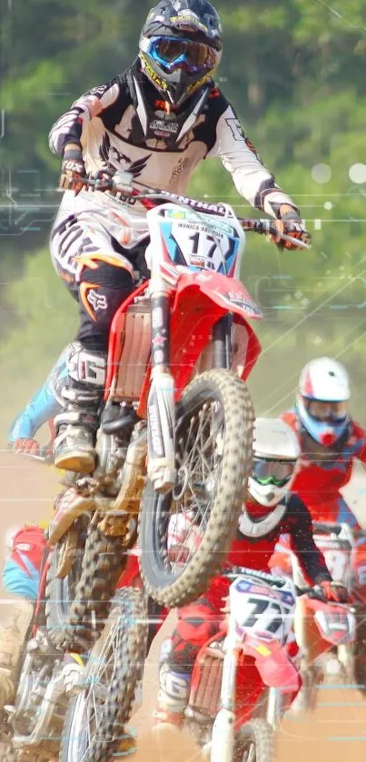 Motorcycle racers in action on a dirt track.