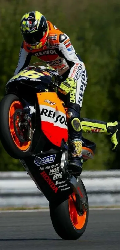 Motorcycle stunt with Repsol bike on track, vibrant colors.