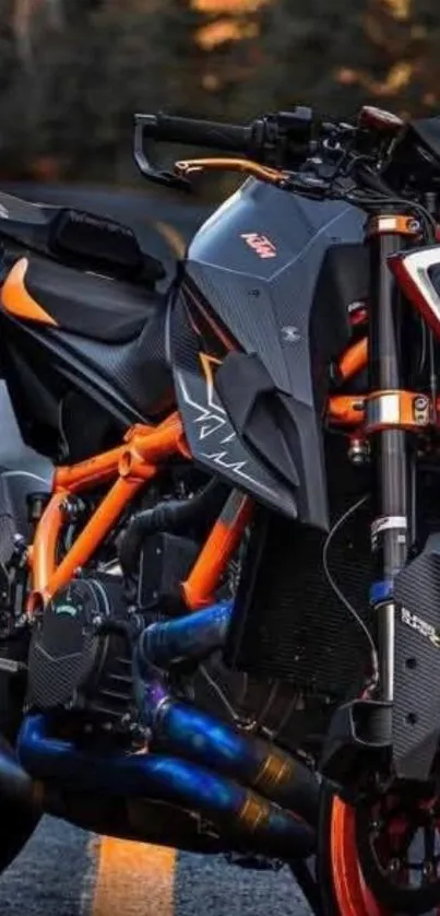 Vibrant motorcycle with orange accents at night.