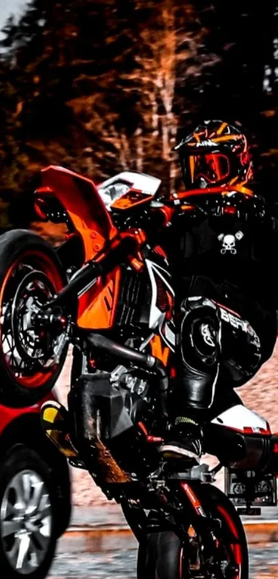 Motorcycle performing a wheelie with vibrant orange highlights.