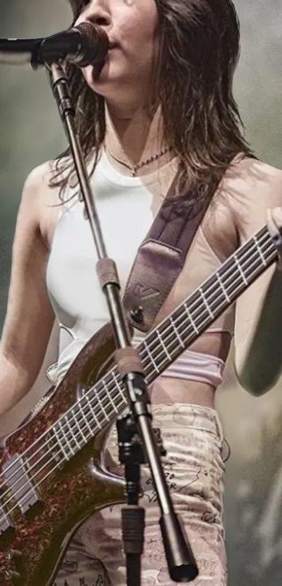 Energetic musician playing bass guitar on stage.