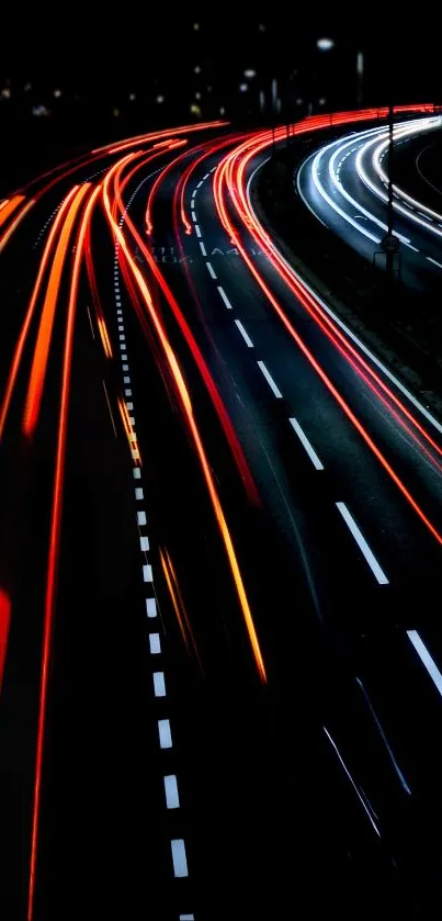 Night road with red and white light trails.