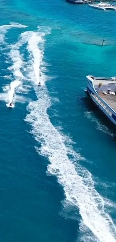 Vibrant ocean scene with jet skis and yacht in azure blue waters.