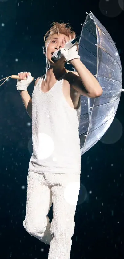 Performer in white with an umbrella on a rainy stage.