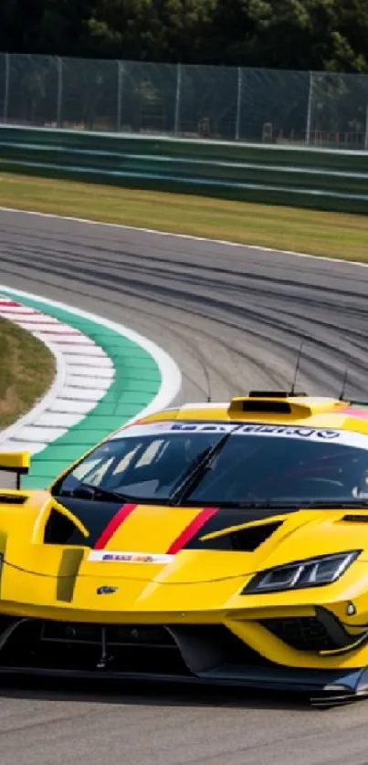 Yellow racing car rounding a track corner.