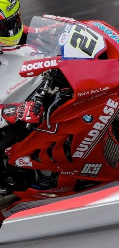 Close-up of red racing motorcycle in motion.