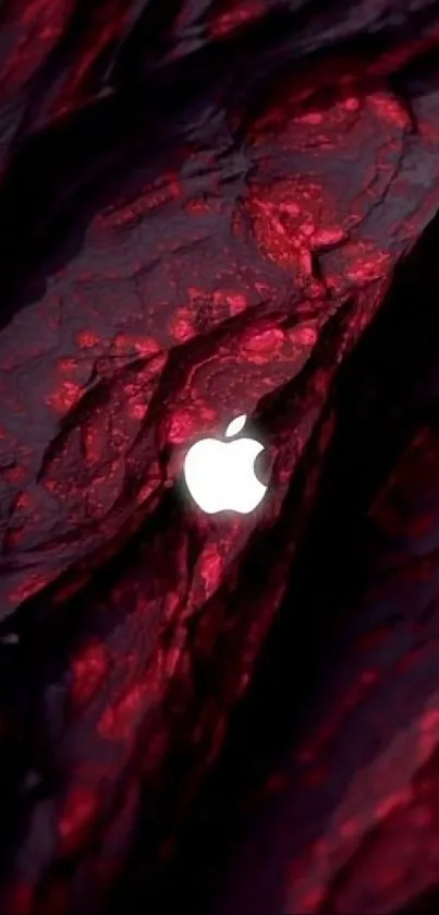 Red Apple logo on dark textured background.