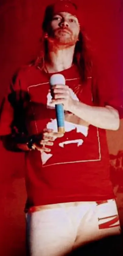 Energetic red-themed concert wallpaper with performer holding a microphone.