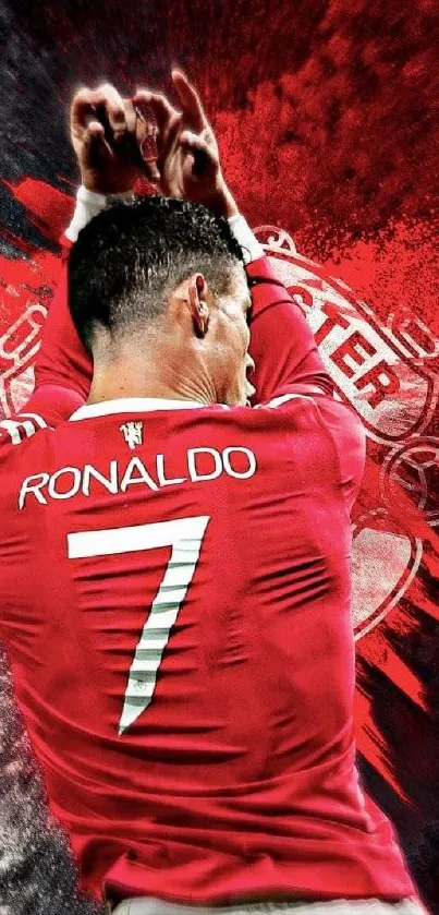 Dynamic footballer in red jersey with graffiti background wallpaper.