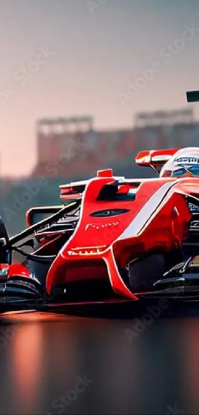 Red racing car on track at sunset.