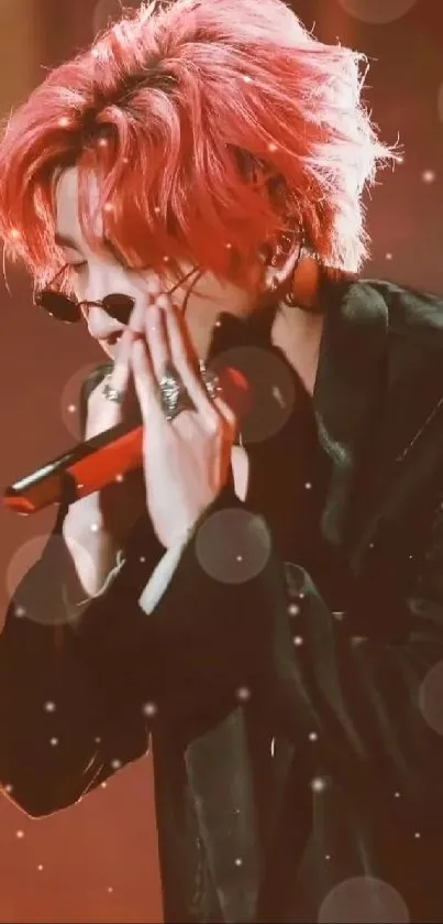 Fiery red-haired singer on stage in dynamic performance.