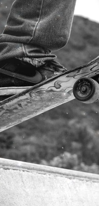 Monochrome skateboarder poised at ramp edge in skate park.