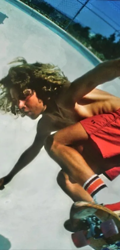 Skateboarder performing mid-air trick in pool with blue sky.