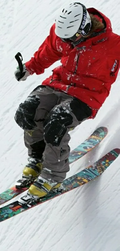 Skier in red jacket performing a jump on a snowy slope.