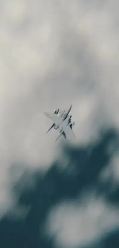 Jet soaring through a cloudy sky in dynamic wallpaper.