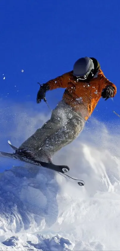 Snowboarder jumps dynamically against a blue sky.