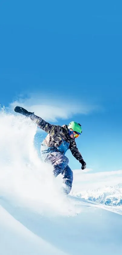 Snowboarder in action on a snowy mountain under a blue sky.