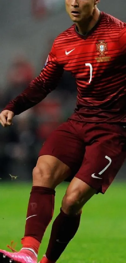 Dynamic soccer player in action on the field, wearing red sports uniform.