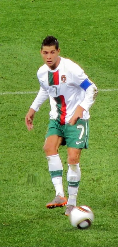 Soccer player on green field in intense action during a football match.