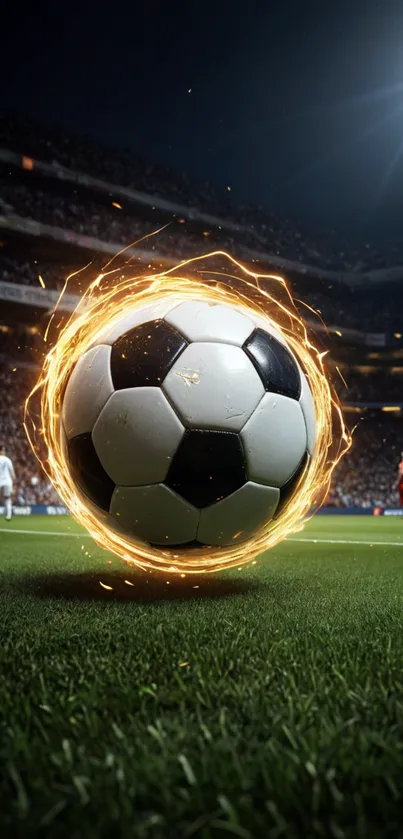 Glowing soccer ball on grassy field during a night stadium match.