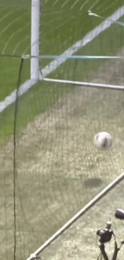 Exciting soccer ball nearing goal net in dynamic sports action.