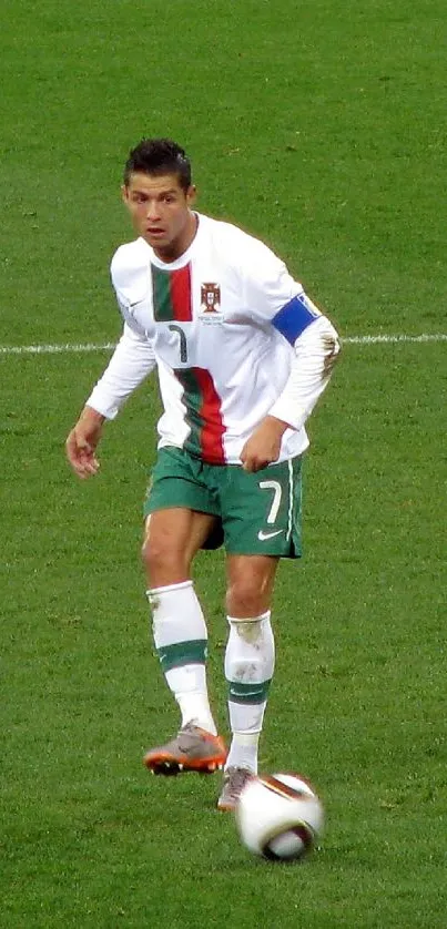 Soccer player in action on green field.