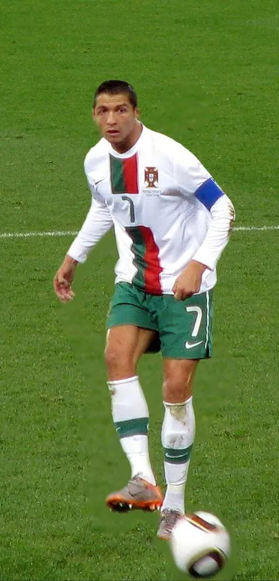 Soccer player from Portugal ready to strike at a football field.