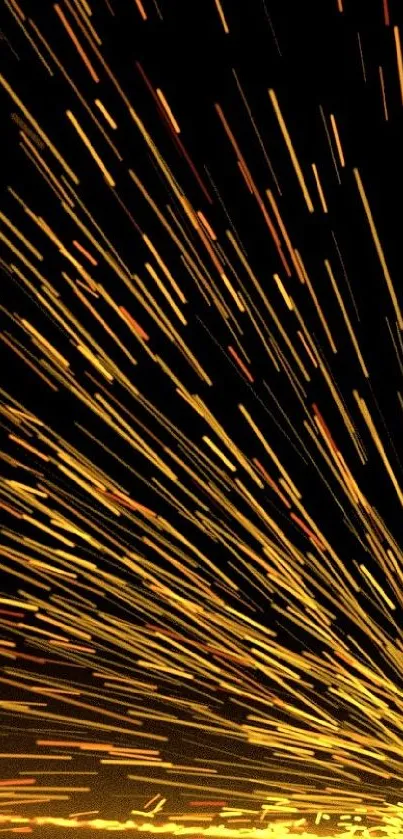 Dynamic golden spark streaks on a dark background, creating an energetic wallpaper.