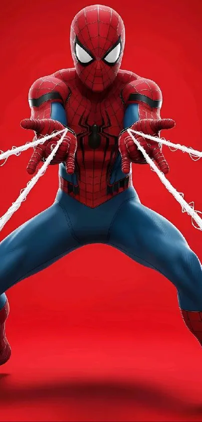 Spider-Man posing with webs against red background.